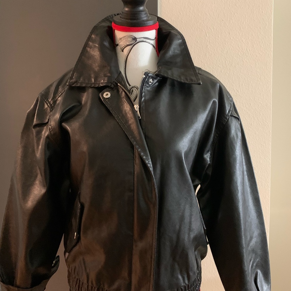 Size small black faux leather jacket!